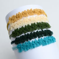 Image 4 of Row Of Bows