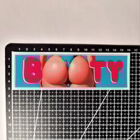 Image 2 of Booty Font With Big Round Booty In Blue Thong As "Os" Matte Vinyl Sticker