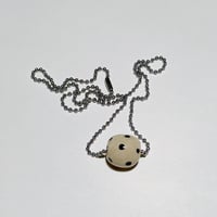 bead on necklace seven