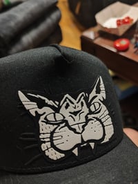 Image 4 of Cat Bites Hat