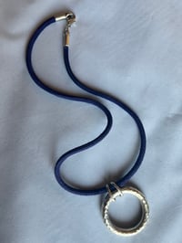 Image 1 of Silver ring on blue cording