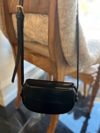 Image 1 of Leather handbag with a rounded shape Black 