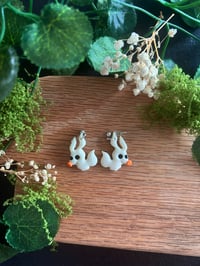 Image 1 of Pendientes zero (brillan en la oscuridad)