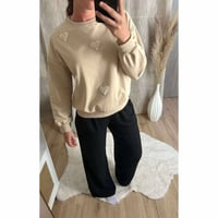 Pull beige avec cœurs 
