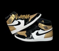 Air Jordan 1 Retro Hi NRG “Pantent Gold Toe” 
