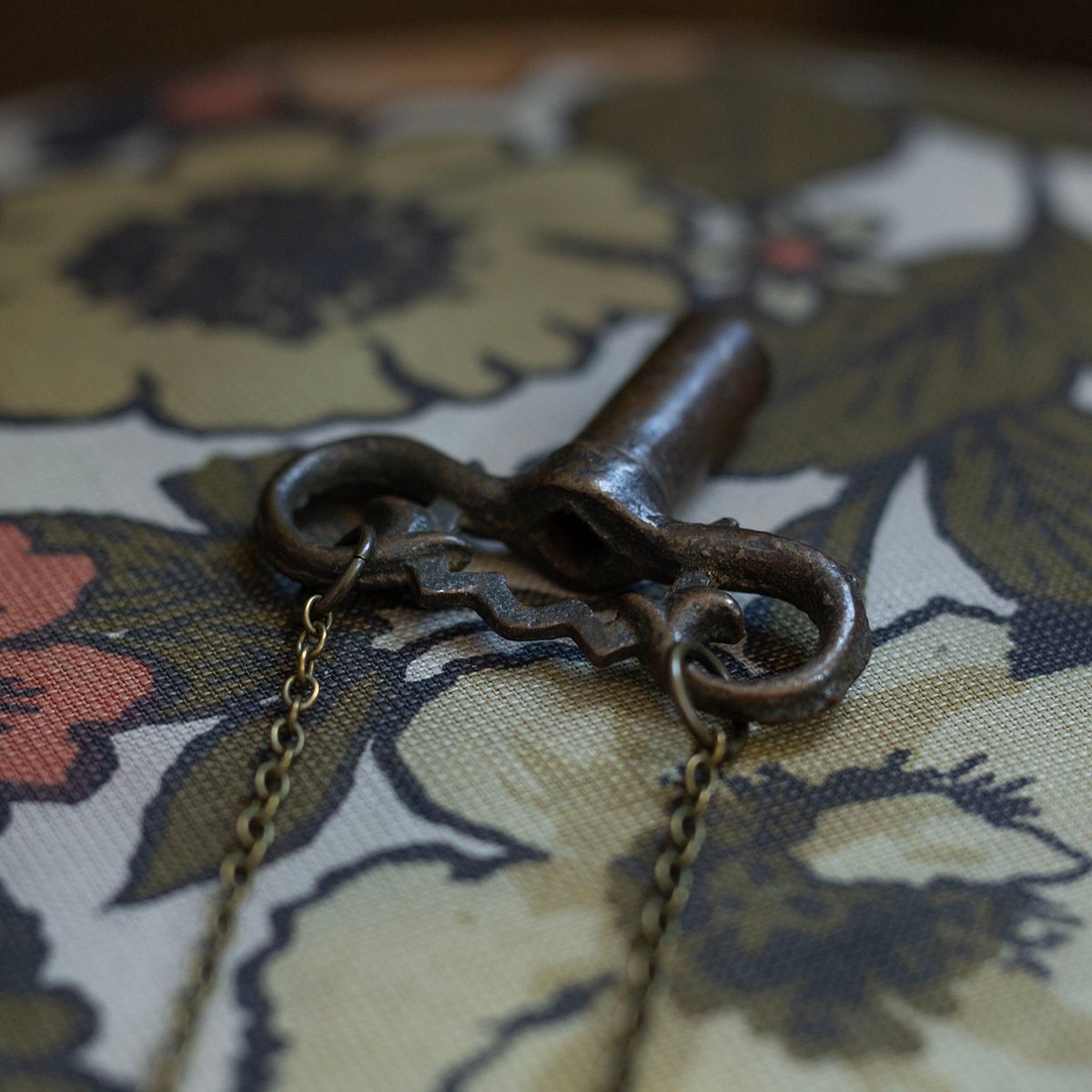 Ornate brass gas valve key necklace