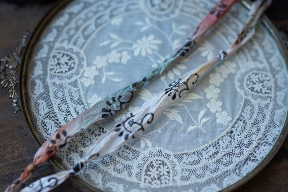 Long flat textured key on "Dream Weaver" cord
