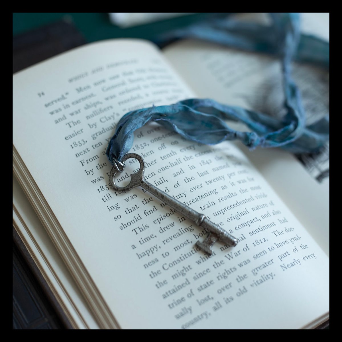 Large silver key on "dusty cloud" cord