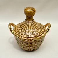 Image 1 of Bouteille vintage en céramique avec anse décor osier tressé  Calvados Liqueur 1960