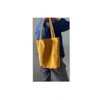 Image 1 of golden spice suede tote bag
