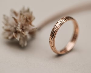 Image of 18ct Rose gold 3mm ‘Olive leaf’ and milled edge engraved ring