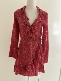Image 2 of Realisation Par Alexandra Diane Wrap Dress. Silk Red Star Print
