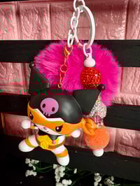 Image 1 of Hello kitty x Tmnt Kuromi keychain  with pink pompom