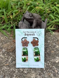 Image of *Plants and Books with Wooden Flower