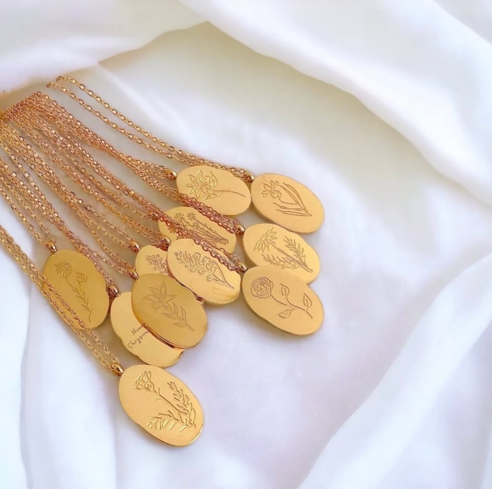 Image of Gold birth flower pendants 