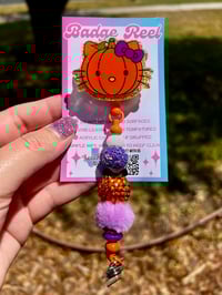Pumpkin Badge Reel