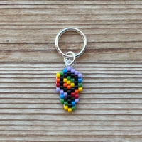 Image 1 of Kvindetegn (regnbue)