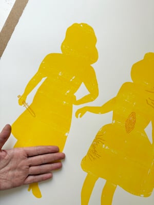 Image of The Yellow Ladies with knife