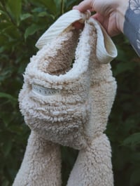 Image 2 of Fleece trapper with oversized bunny ears 