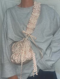 Image 1 of Cream Polka Dot Pudding Pouch 