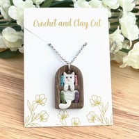 Image 2 of Cat Bookshelf Necklace | Cozy Reading Bookish Pendant