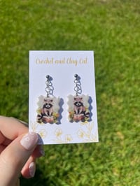 Image 2 of Watercolor Raccoon Earrings