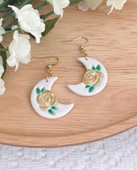 Image 4 of Whimsical Floral Moon Earrings