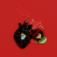 Image 1 of UTDR — Proceed Heart Charm