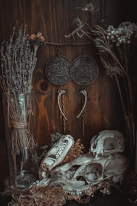 Image 6 of Nights flight, rib bone flying witch earrings