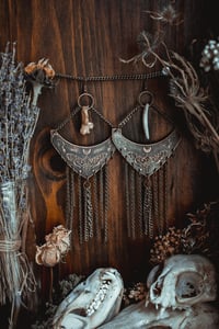 Image 1 of moth and moon bone earrings