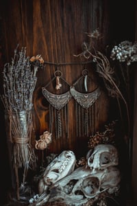 Image 3 of moth and moon bone earrings