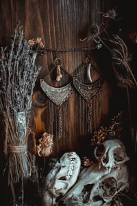 Image 6 of moth and moon bone earrings