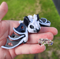 Image 1 of Baby Hollow Bat