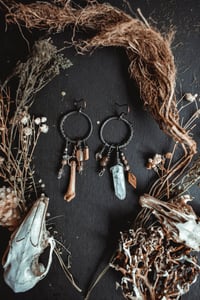 Image 3 of Mismatched bone earrings