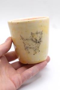 Image 1 of this kitty woke up and craves chaos in yellow