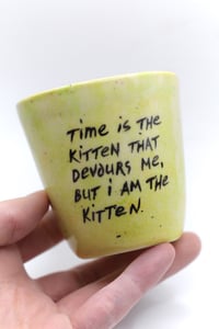 Image 2 of Time is the kitten that devours me, but I am the kitten