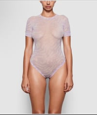 Image 1 of SKIMS- SUMMER SHEER T- SHIRT BODYSUIT - LILAC SWIRL