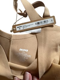 Image 5 of SKIMS- UNLINED PLUNGE THONG BODYSUIT- CLAY