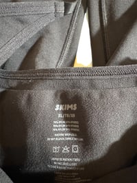 Image 5 of SKIMS- BUTT LIFTING OPEN BUST BODYSUIT- ONYX