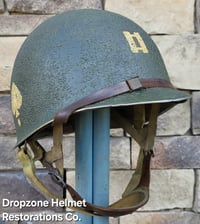 Image 1 of WWII M2 101st Airborne Helmet 506th PIR "E" Co. D-bale Front Seam Firestone-INLAND liner. Captain.