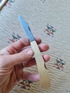 Brass scale lockback