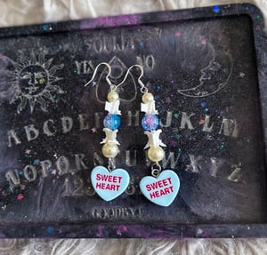 Image of Candy Heart Snake Vertebrae Earrings