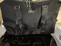 Image 1 of Black bag 