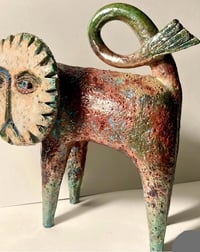 Image 4 of Swirly tailed Lion 