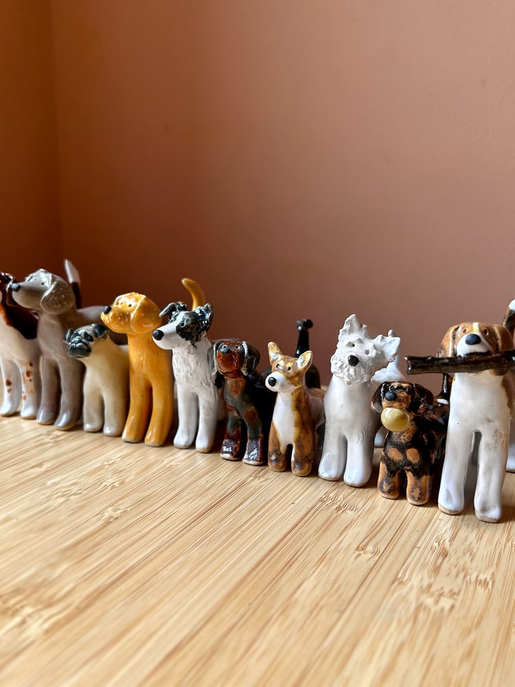 Image of ceramic pooch sculptures