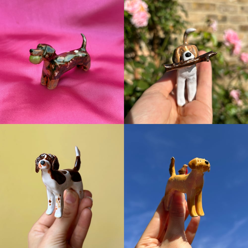 Image of ceramic pooch sculptures
