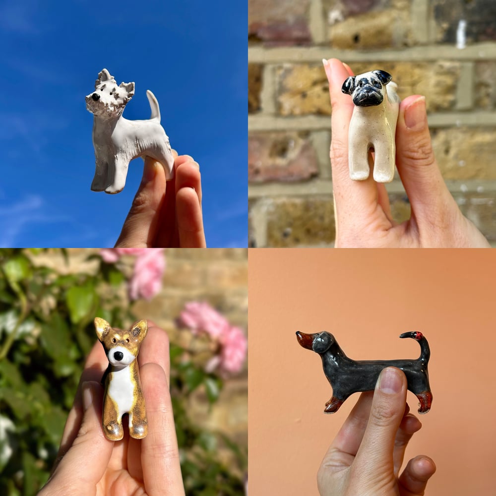 Image of ceramic pooch sculptures