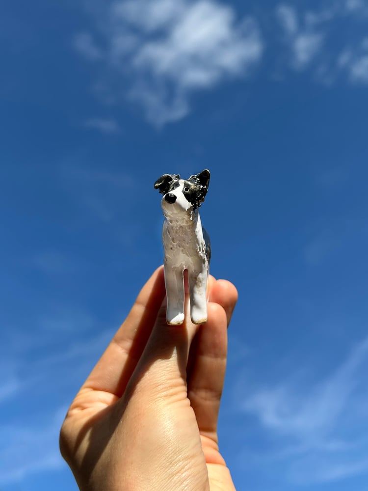 Image of ceramic pooch sculptures