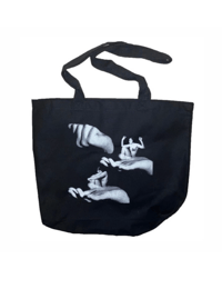 zuzu in hands tote 