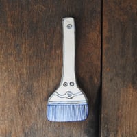 Image 2 of anxious brush